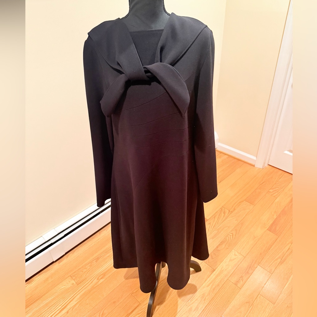 Elegant Black Dress With Attached Pieces Of Scarf On Each Side On The Top.